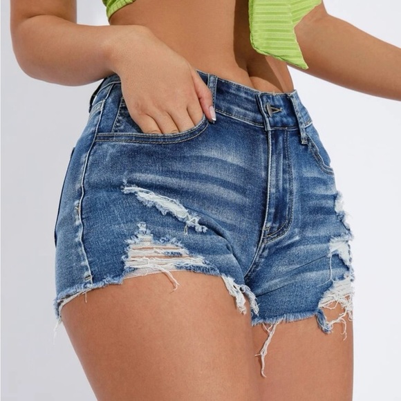 SHEIN Essnce Ripped Raw Trim Denim Shorts in Medium Wash - Picture 7 of 11